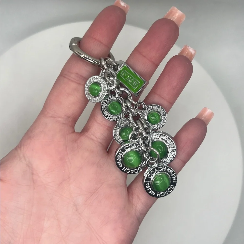 036.Silver and Green Keychain. Box included.